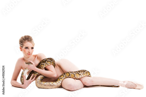 attractive nude ballerina lying with python on isolated white