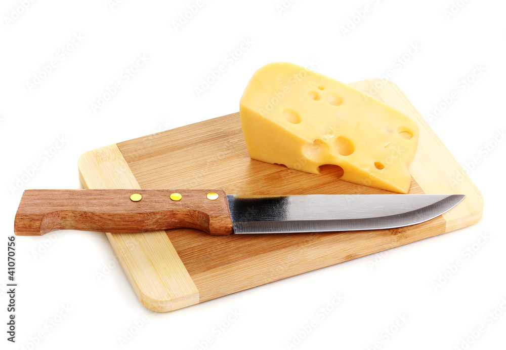 Cheese on cutting board with knife isolated on white