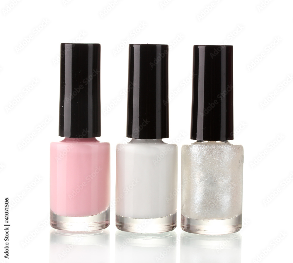 Three nail polish isolated on white Three nail polish isolated on white