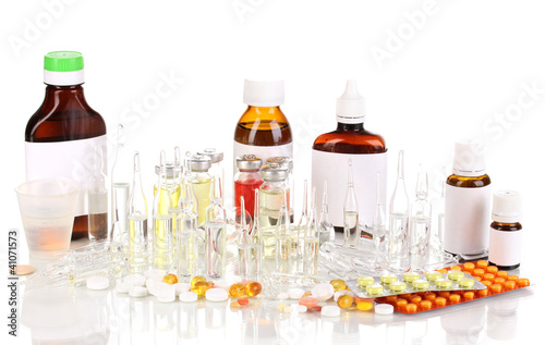 Medical bottles with medical ampoules and tablets isolated