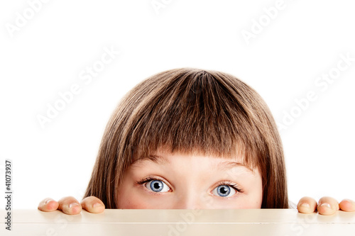 Pretty young girl looking surprised