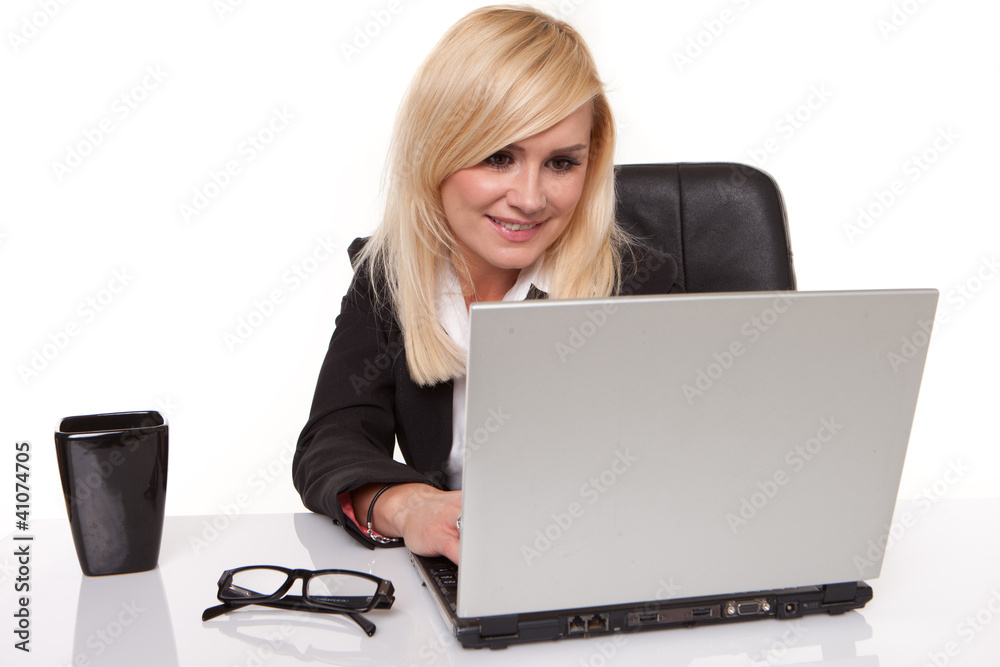 Blonde businesswoman chatting on her mobile Blonde businesswoman chatting on her mobile