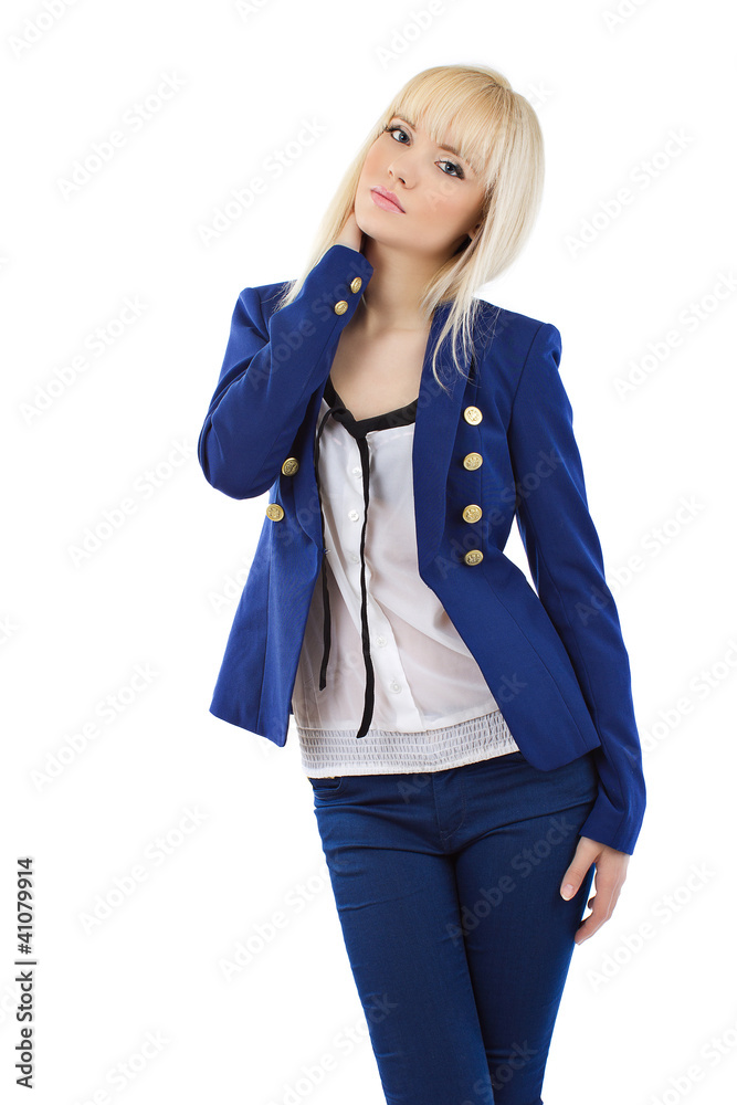 Beautiful young blonde girl in blue pants and jacket posing Beautiful young blonde girl in blue pants and jacket posing