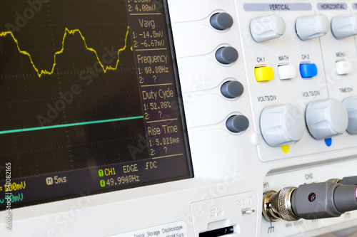 distorted voltage waveforms on a digital oscilloscope laboratory photo