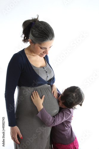 Pregant woman with her daughter