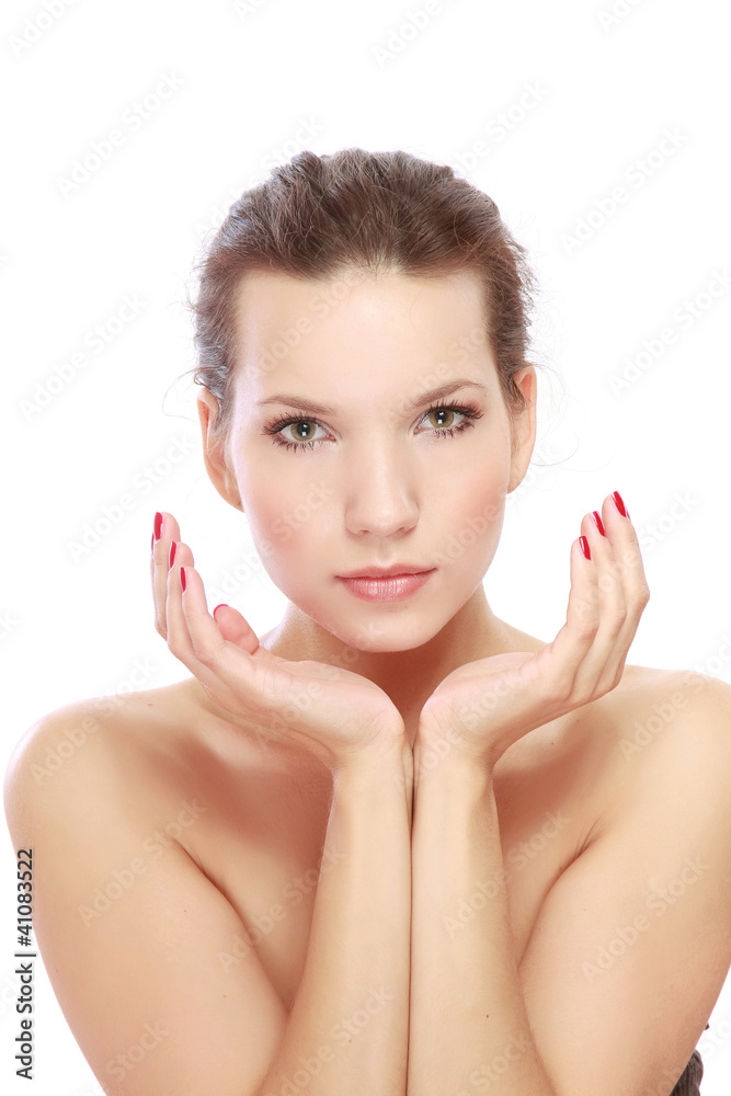 Fototapeta premium A beautiful woman framing her head with hands