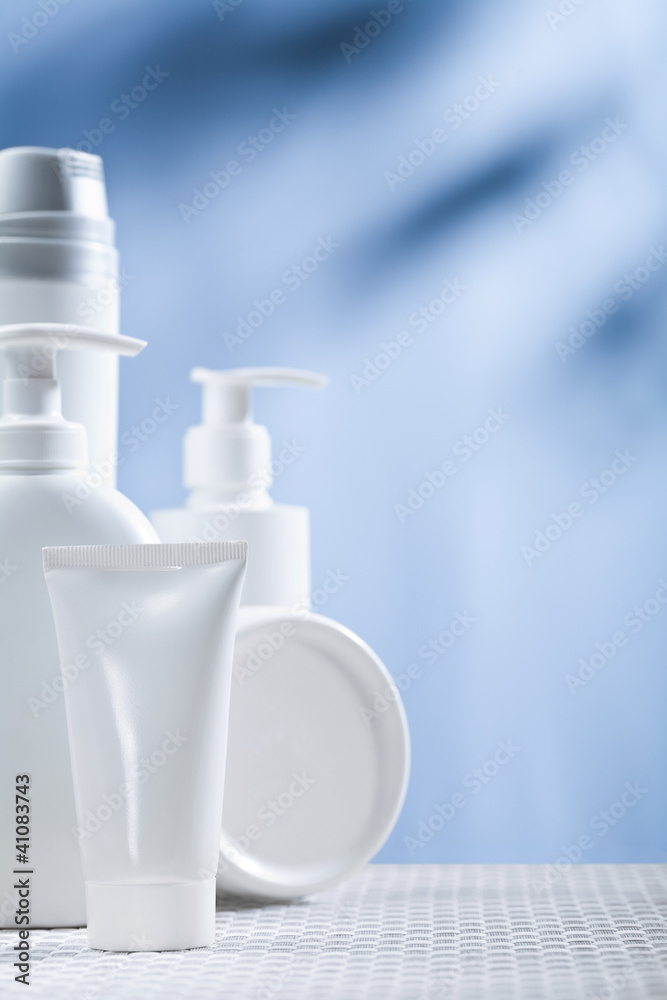skincare items on blue background skincare items on blue background