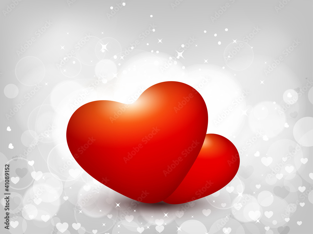 Pair of Glowing heart on abstract background.
