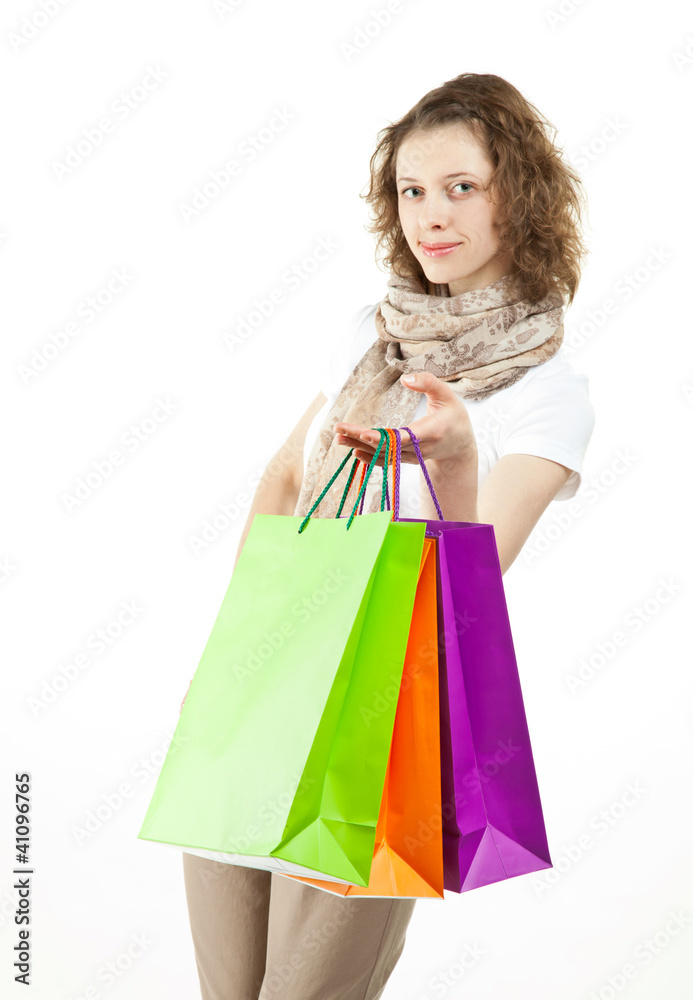 Beautiful girl with shopping paper bags