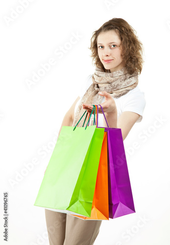 Beautiful girl with shopping paper bags