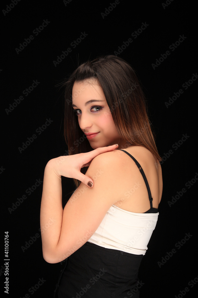 beautiful young girl on a black background