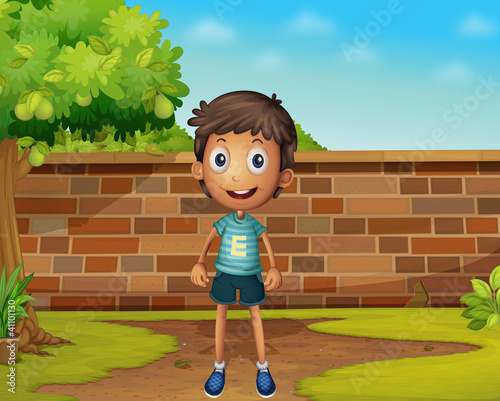 Boy standing in the yard