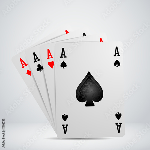 A winning poker hand of four aces playing cards