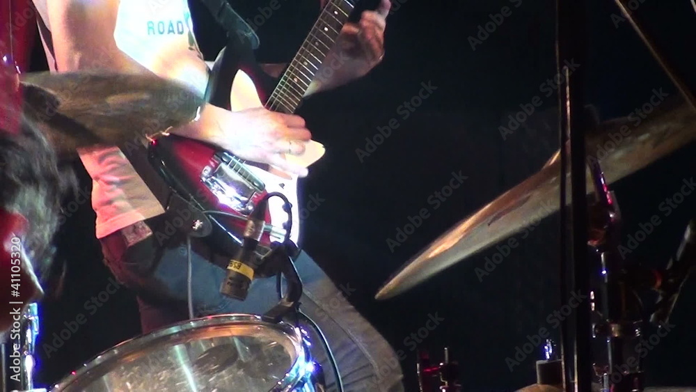 Guitarist and drummer at concert