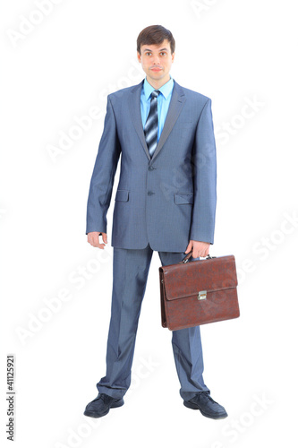 The young businessman with a portfolio. Isolated