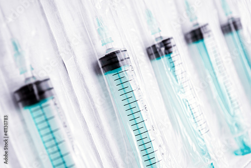 Plastic syringes.