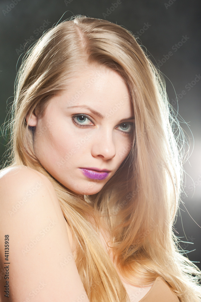 Close up portrait of a beautiful female model. Close up portrait of a beautiful female model.