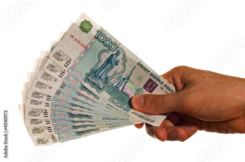 One thousand ruble bills in a hand
