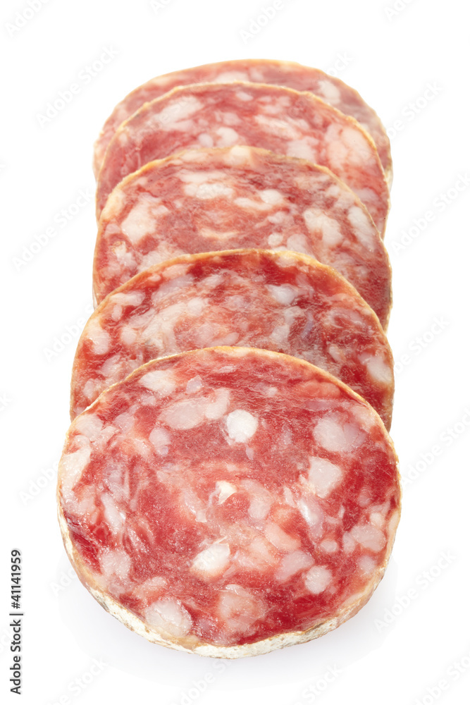 Salami slices on white, clipping path included Salami slices on white, clipping path included