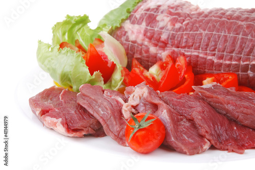 raw meat on white plate