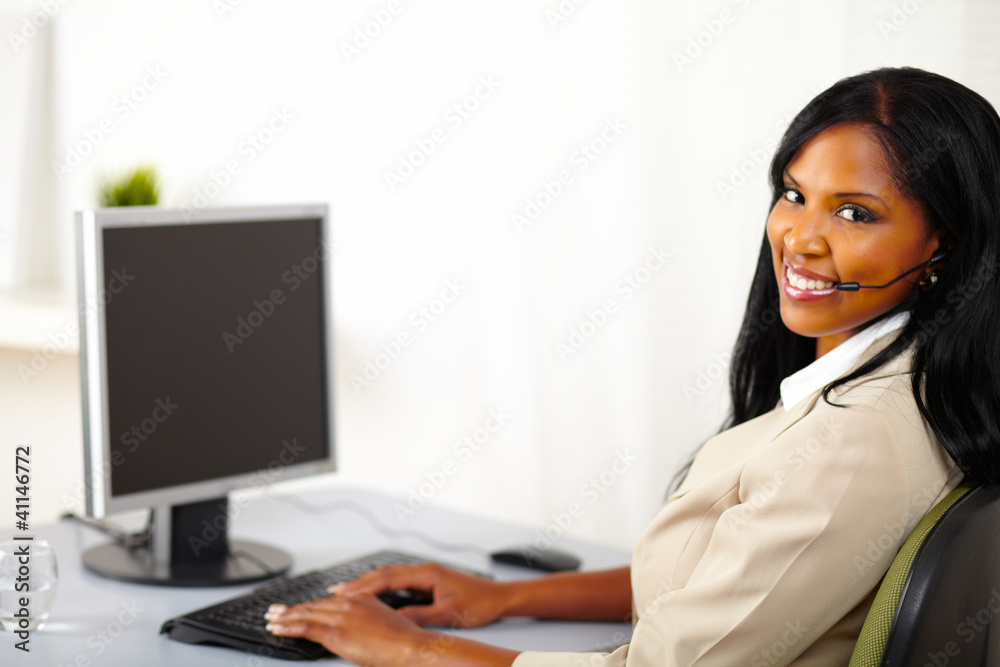 Young secretary with headphones Young secretary with headphones