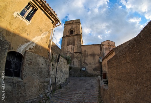 Fisheye view of old street in Savoca village, Italy, at sunset