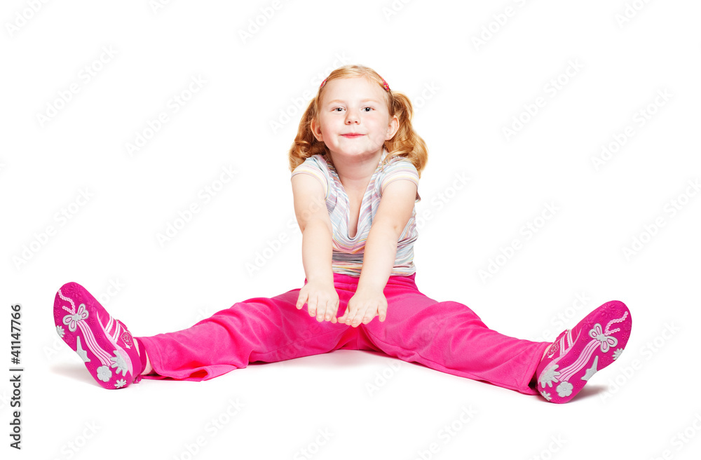 little girl stretching studio isolated on white background little girl stretching studio isolated on white background
