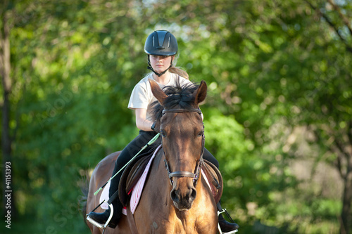 girl jockey on horse