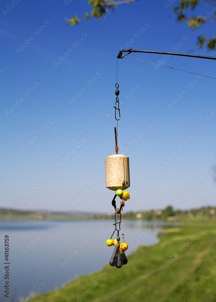 Equipped with a bait for carp, tehnoplankton attached to a fishi Equipped with a bait for carp, tehnoplankton attached to a fishi