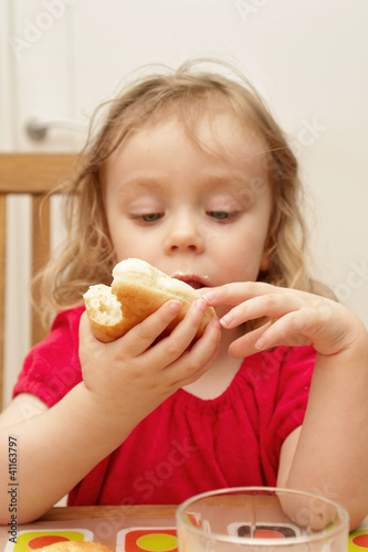 Young girl eating