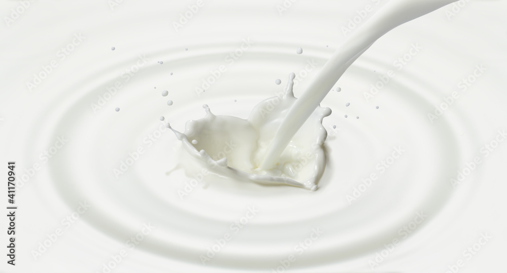 pouring milk or white liquid created splash in heart shape pouring milk or white liquid created splash in heart shape