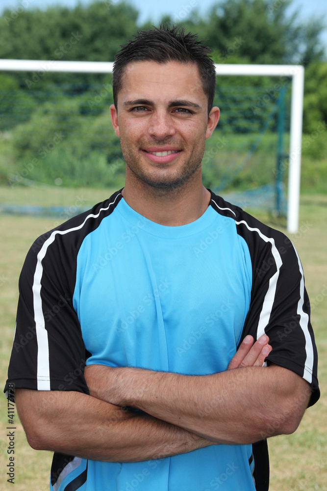 Fototapeta premium Football player stood on pitch