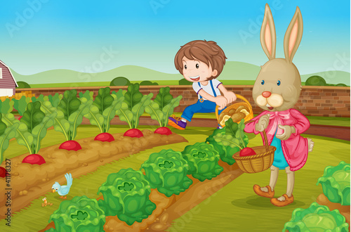 Fototapeta Naklejka Na Ścianę i Meble -  Bunny and boy in the garden