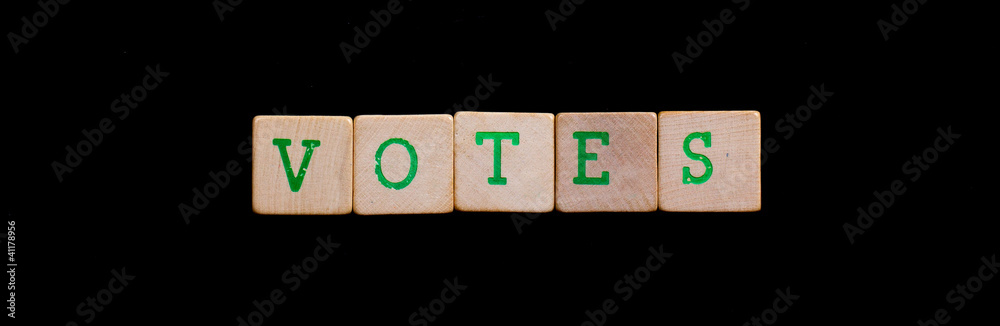 Letters on wooden blocks (votes) Letters on wooden blocks (votes)