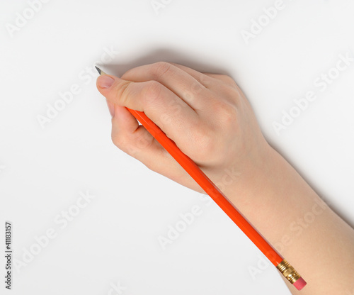 Hand with red pencil
