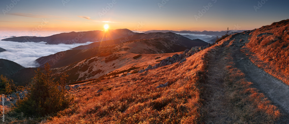 Naklejka premium Mountain panorama at sunset with path - Low Tatras ini Slovakia