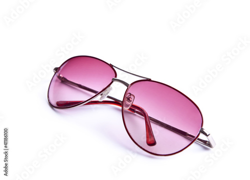 Pink sunglasses on white