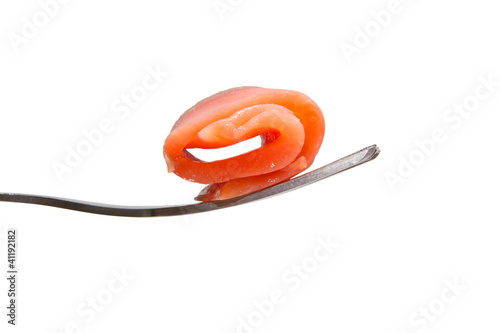 Roll of salmon slice on a fork