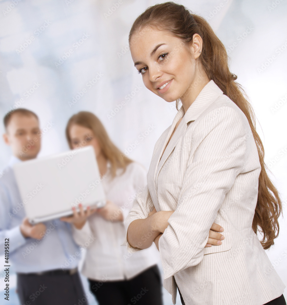Group of happy business colleagues in office