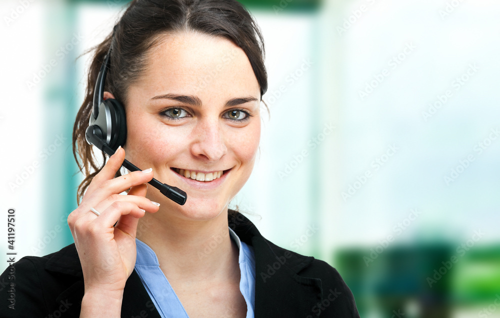Beautiful customer representative at work Beautiful customer representative at work