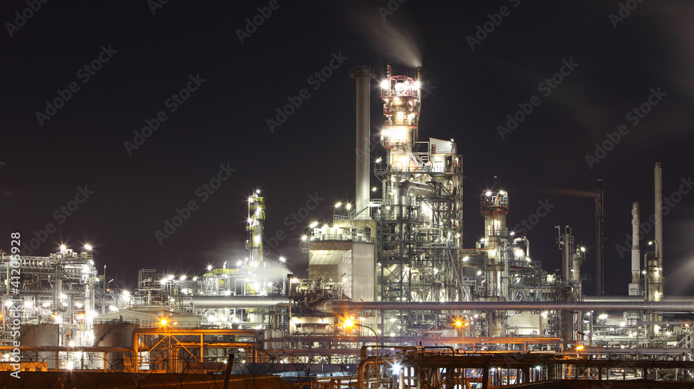Oil and gas refinery plant at night - Petrochemical factory