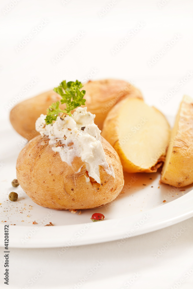 Baked potato filled with soft cheese Baked potato filled with soft cheese