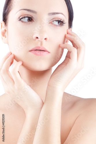 closeup woman portrait with two hands near face