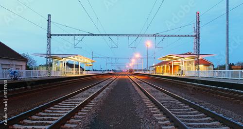 Railway with train platform at night