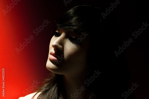 Portrait of an asian woman in a black background