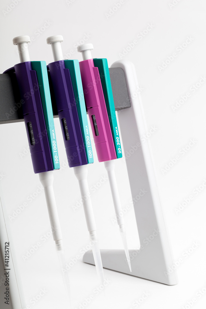 Three pipettes on a stand Three pipettes on a stand
