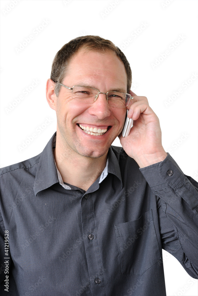Portrait of a handsome business man speaking over phone Portrait of a handsome business man speaking over phone