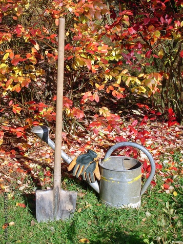 Old garden tools arrangement in autumn