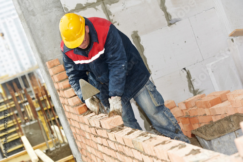 construction mason worker bricklayer © Kadmy