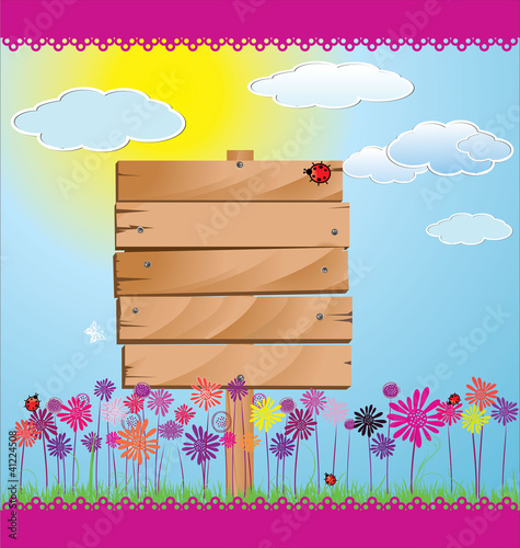 Wood sign with grass, flower and blue sky